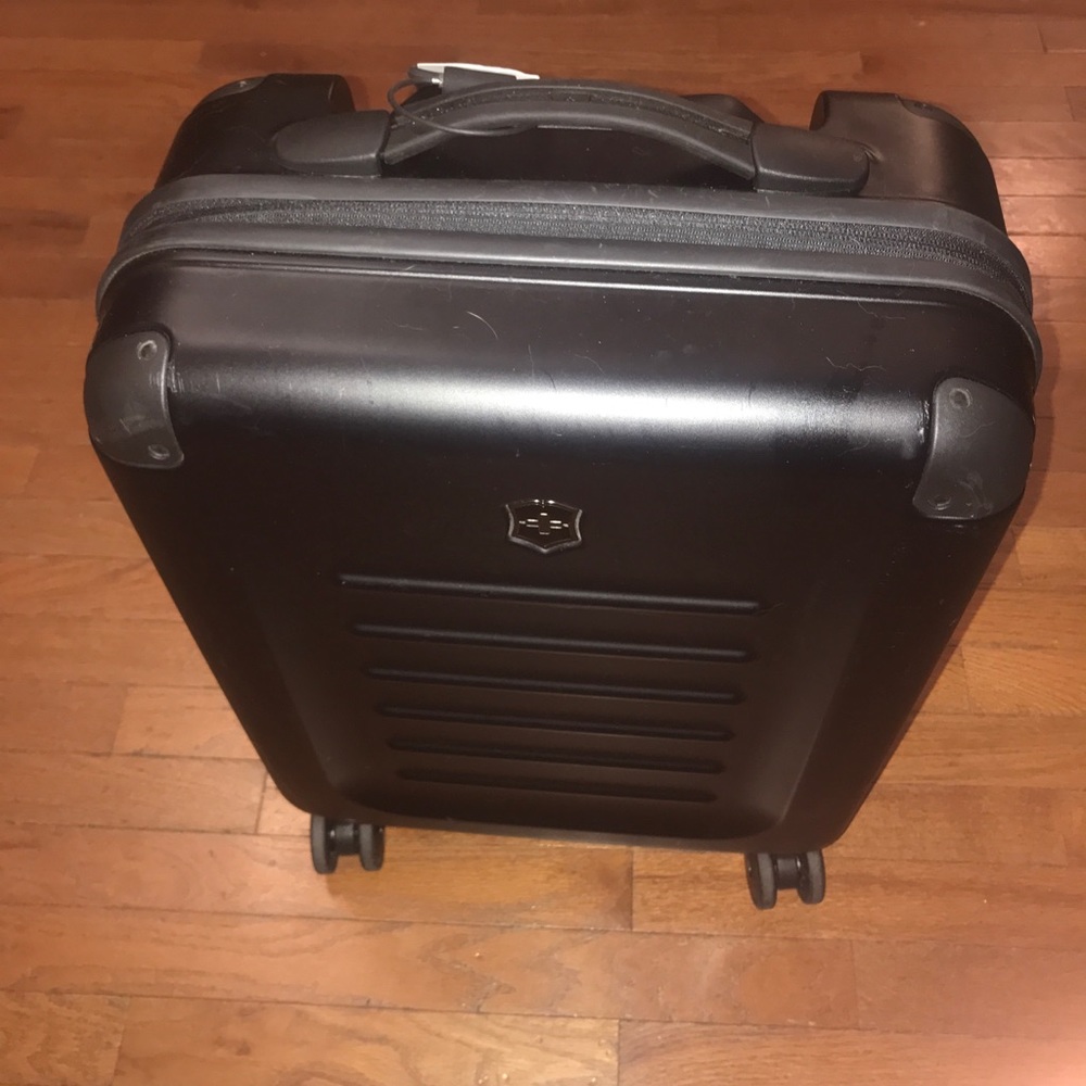 Victorinox black carry on roller board